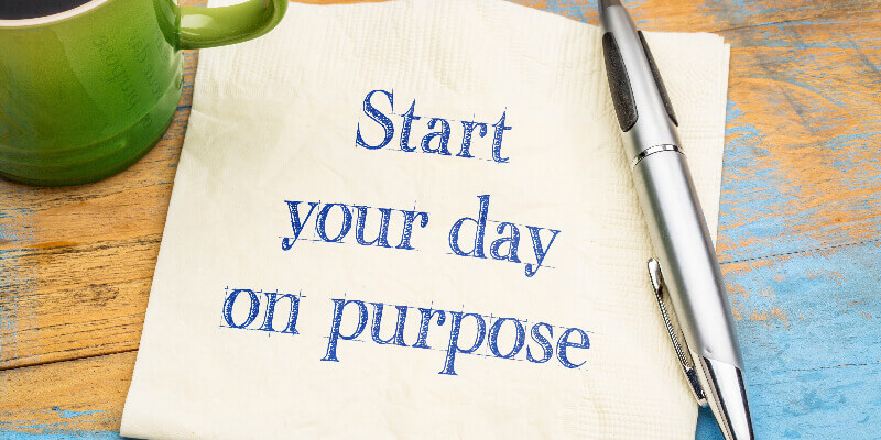 Start you day on purpose written on a napkin